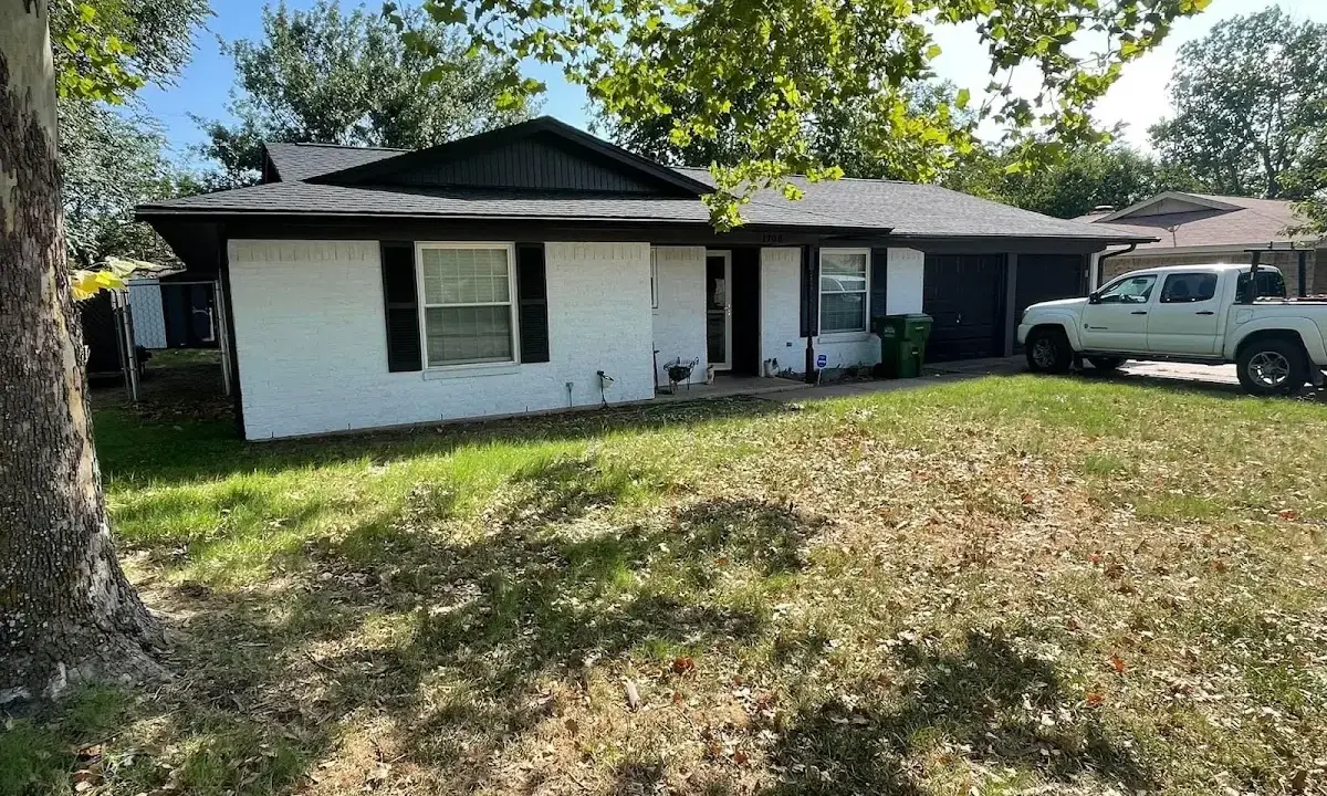 Professional roofing crew working on a residential roof in Port Chester